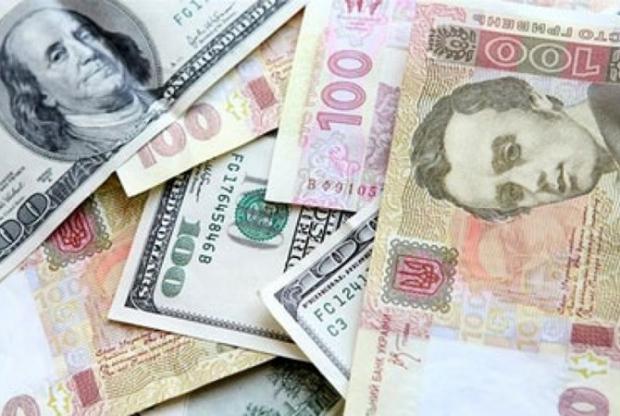 Долар та гривня. Фото: metronews.net.ua. 