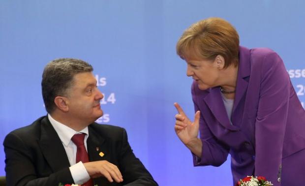 Петро Порошенко та Ангела Меркель. Фото: newsnr.com.