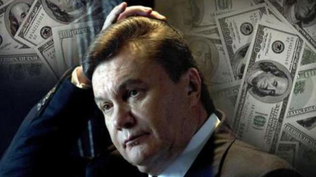 Гроші, вкрадені Януковичем, лежать в державному "Ощадбанку", однак повернути їх в бюджет Україна поки що не може. Ілюстрація:ua.korrespondent.net