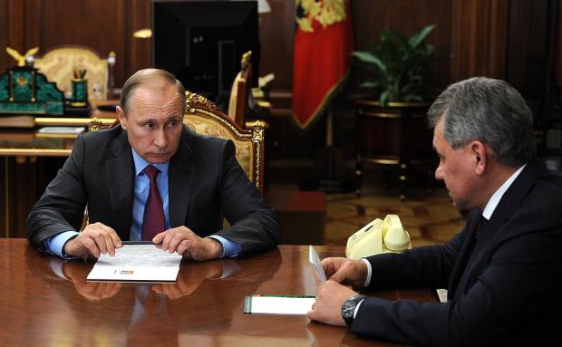 Путін і Шойгу оголошують про виведення військ з Сирії. Фото:tjournal.ru