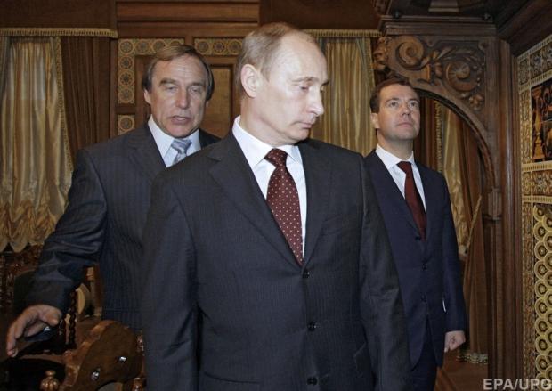 Ролдугін, Путін і Медведєв у 2009 році