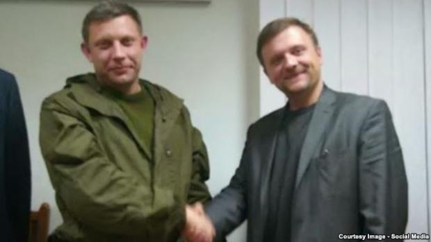 Матеуш Піскорський справа. Ліворуч - Захарченко, директор "ДНР". Фото: svoboda.org