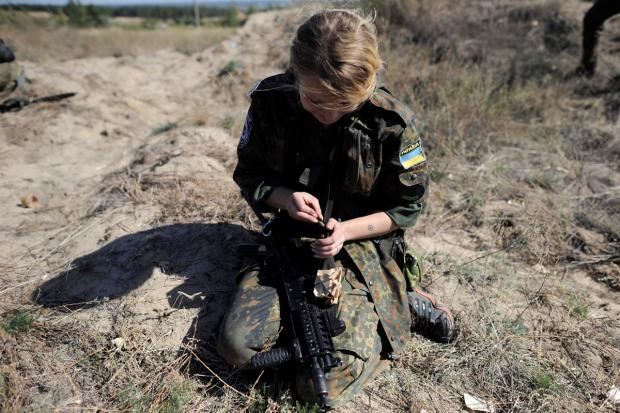 Війна з жіночим обличчям. Фото: REUTERS.