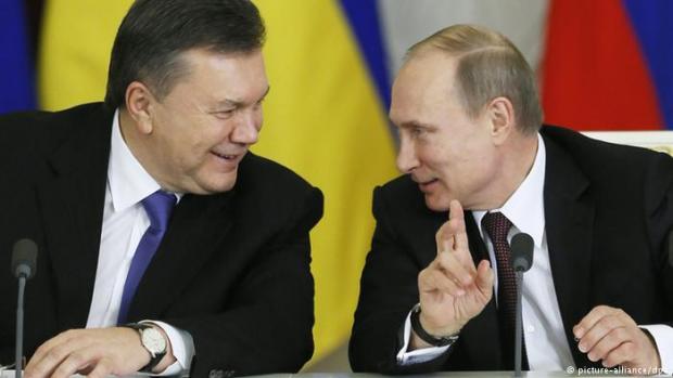 Янукович і Путін. Ілюстрація:Deutsche Welle