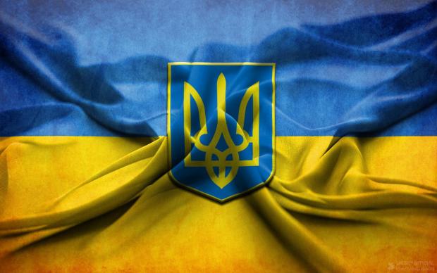 Прапор та герб України. Фото: posnayko.com.ua