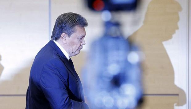 Суд конфіскував гроші Януковича. Фото: Укрінформ.