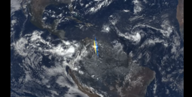 Жовто-блакитні спалахи над Землею. Фото: скріншот з відео.