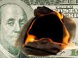 Не з'їм, то понадкушую: У США грабіжники-невдахи спалили гроші у банкоматі