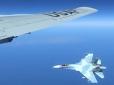 Нова провокація: У мережі показали фото небезпечного зближення російського Су-27 з американським літаком-розвідником над Балтикою
