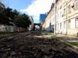 Наслідки негоди: В Одесі потужна злива змила асфальт з цілої вулиці (фото, відео)