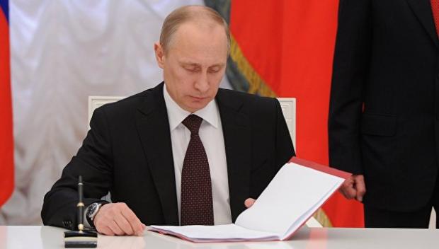 Путін підписав черговий закон, який обмежує права росіян. Ілюстрація: РИА Новости.