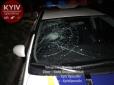 П'яні розваги нічної столиці: Побили поліцейських і розгромили їхнє авто (фото, відео)
