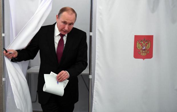 Путін проголосував за себе на виборах президента РФ. Фото:УНІАН
