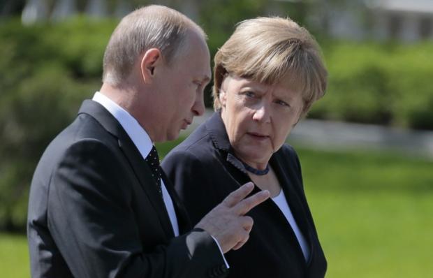 Путін і Меркель. Фото: EADaily.