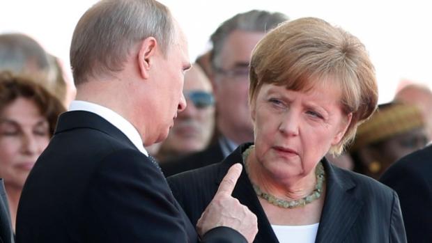 Путін і Меркель. Фото:1tv.mk