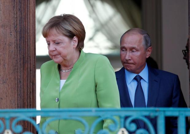 Зустріч Меркель і Путіна пройшла не дуже вдало для Кремля. Ілюстрація: Линия обороны