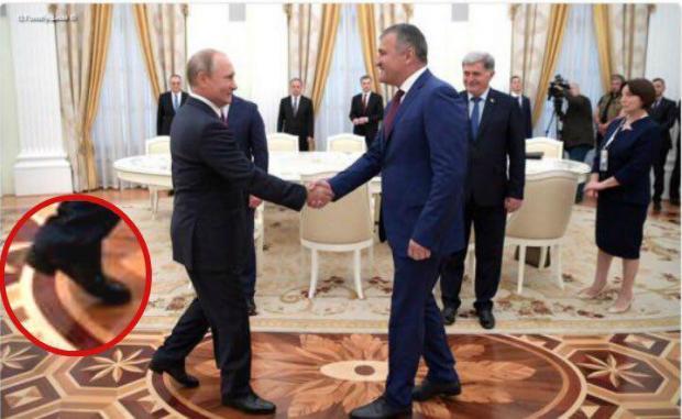 "Занадто довгі штани": низький Путін знову "засвітився" на підборах