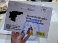 Знову ототожнили агресора і жертву: Amnesty International випустила конверти, де українець обіймає росіянина (фото)