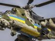 Пілоти ЗСУ здійснили посадку свого гелікоптера у полі, щоб дати цукерки хлопчику, який махав їм прапором України (відео)