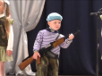 Діти на службі у бойовиків: Опубліковано відео пропагандистського свята  терористів 