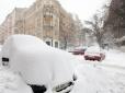 Перший раз за рік можна сніговиків ліпити: Київ неочікувано засипало снігом (фото, відео)