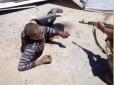 Підірвали пах, роздробили ноги й обезголовили: Звірства армії Путіна в Сирії (відео 16+)