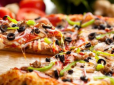 Домашня піца: Секрети приготування смачної випічки