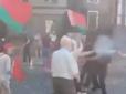 Сталася потасовка: Під посольством Білорусі в Києві забризкали газом прихильників Лукашенка (відео)