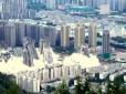 Роззяви були у захваті: У Китаї одночасно підірвали відразу 15 хмарочосів (відео)