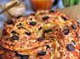 Нагадує піцу, але ще смачніше: Рецепт пирога-косички із шинкою та сиром від популярної блогерки