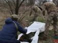 На Харківщині діти знайшли тіло окупанта, граючись на луках (фото)