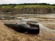 Через обміління Дніпра на березі Хортиці знайдено 1000-літній дубовий човен у чудовому стані (відео)